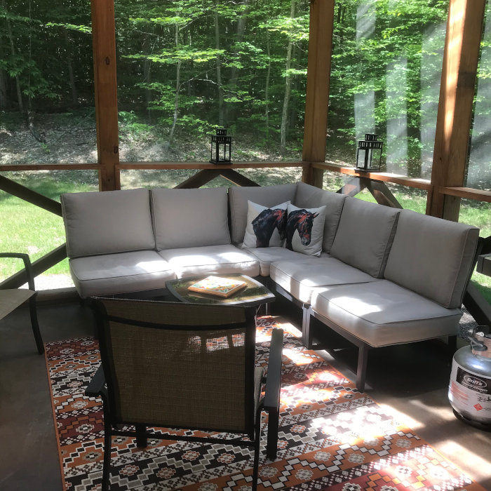 Sitting area on screened in porch